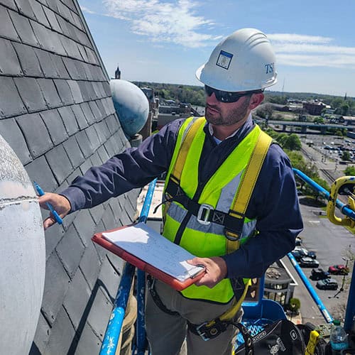 Technician working on the roof